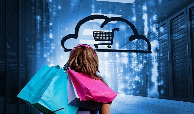 Woman in a data center holding shopping bags and looking at a drawing with a shopping cart into a cloud